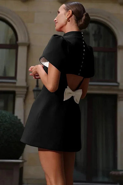 Elegant Petal Sleeve Mini Dress with soft flowing sleeves, a flattering mini length, and a luxurious fabric blend—perfect for any occasion.