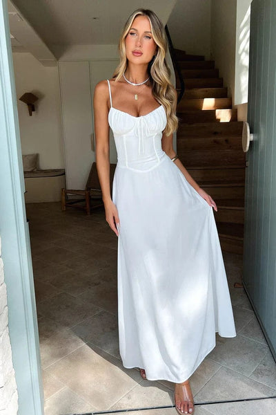 Sleeveless lace-up maxi dress with a flowing silhouette, adjustable lace-up front, and breathable fabric—perfect for elegant and casual occasions.