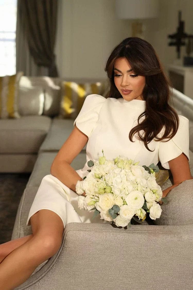 Elegant Petal Sleeve Mini Dress with soft flowing sleeves, a flattering mini length, and a luxurious fabric blend—perfect for any occasion.