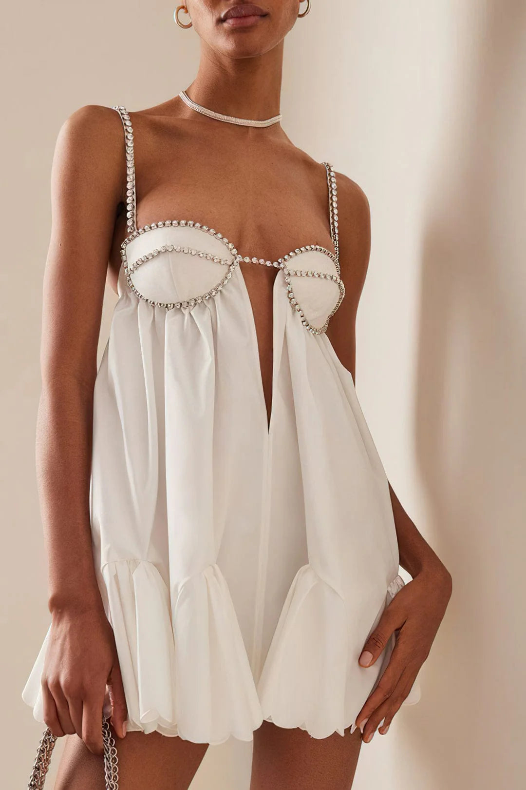 Elegant V-neck mini dress with rhinestone decor, fitted silhouette, and semi-transparent cotton blend fabric—perfect for casual and evening wear.