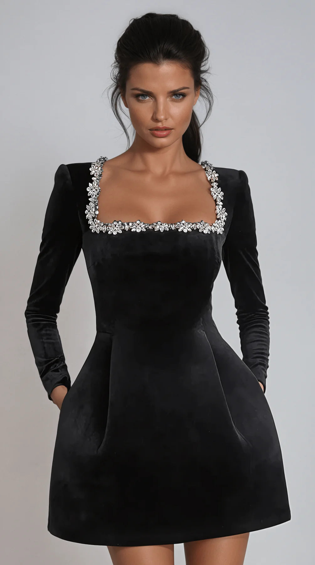 Embellished neckline velvet mini dress with a rich velvet finish, intricate embellishments, and flattering mini silhouette—perfect for formal events and festive occasions.