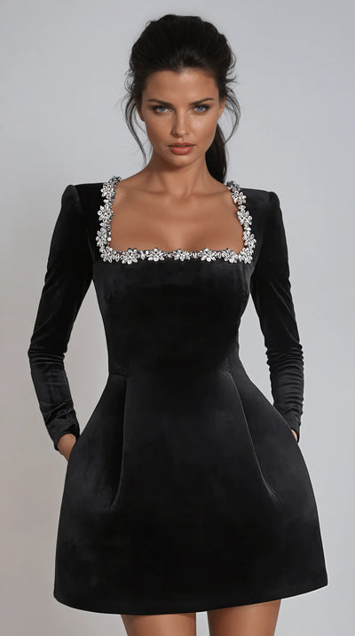 Embellished neckline velvet mini dress with a rich velvet finish, intricate embellishments, and flattering mini silhouette—perfect for formal events and festive occasions.